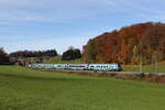 1116 231  BIO AUSTRIA  schob am 31. Oktober 2025 die  Klima-Railjet-Garnitur  bei Axdorf im Chiemgau in Richtung Salzburg.
