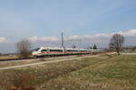 412 215 war als  ICE 118  am 4. März 2026 bei Übersee am Chiemsee auf dem Weg nach Münster.