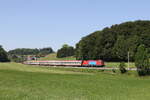 1116 077 'Made by Industrie' war mit einem 'EC' am 26. Mai 2026 bei Axdorf im Chiemgau in Richtung Salzburg unterwegs.