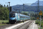 �BB 1116 244 mit Klimaticket-RJX 19982 Wien - Innsbruck in Teisendorf, 04.06.2026. Man beachte die Scheibenwischer-Stellung.