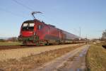 Die 1116 220 mit Railjet bei Übersee am 08.12.2013