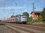 Br 111 027 mit der RB 5429 auf dem Weg nach Innsbruck Hbf passiert gerade die Station Mnchen Westkreuz