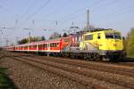 Die ADAC 111 024-6 zieht die RB von Mnchen nach Garmisch Partenkirchen durch Mnchen Westkreuz am 25.04.2013