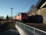 Am 01.03.2012 zog 111 033 ihre RB nach Innsbruck HBF aus dem Murnauer Bahnhof.