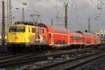 Die ADAC 111 024-6 mit dem RE von Mnchen Hbf nach Mittenwald bei der Einfahrt in Pasing am 30.11.2012