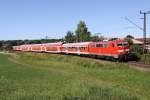 Die Klner 111 123-6 zieht die RB von Mnchen nach Mittenwald kurz vor Ohlstadt am 01.08.2013