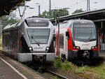 ET 22 2104 und 3427 008 A am Hauptbahnhof Wanne-Eickel.