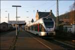 ET23003 beschleunigt als ABR99618, (RE16  RUHR-SIEG-EXPRESS ) nach Siegen. Aufgenommen in Plettenberg am 17.12.07
