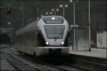 ET23009 fhrt als ABR99728, (RB91  Ruhr-Sieg-Bahn ) von Hagen Hbf ber Finnentrop und Altenhundem nach Siegen, in Werdohl ein. (21.01.2008)