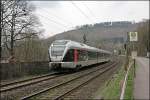 ET23002 ist bei Altena(Westf) als ABR99735 (RB91  Ruhr-Sieg-Bahn ) nach Hagen Hbf unterwegs.