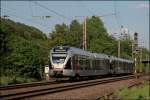 ET22004 und ET23001(?) fahren bei Plettenberg als ABR99657, (RE16  Ruhr-Sieg-Express ) von Siegen nach Essen Hbf, der Abendsonne entgegen. (12.05.2008)
