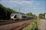 ET22004 und ET23001(?) fahren bei Plettenberg als ABR99657, (RE16  Ruhr-Sieg-Express ) von Siegen nach Essen Hbf, der Abendsonne entgegen.