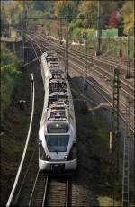 ET23001 und ein weiterer ET22 sind als ABR99611 (RE16  Ruhr-Sieg-Express ) nach Essen unterwegs. (13.10.2008)
