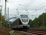 ET 23006 (3-teiliger Stadler Flirt) der Abellio Rail NRW fhrt am 18.05.2012 hat den Bf Kreuztal verlassen und fhrt weiter Richtung Siegen Hbf.