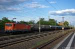 143 001  White Lady  ArcelorMittal Eisenhttenstadt Transport GmbH mit einem Kesselzug  Kohlenstaub , bei der Einfahrt in Nennhausen.