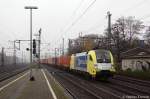 ES 64 U2 - 015 (182 515-7) MRCE Dispolok GmbH fr boxXpress.de GmbH mit Containerzug in Hamburg-Harburg.