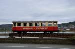 Commercial Icon......an der B9...Am Orsteingangschild in Brohl-Lützing an der alten Verladeeinrichtung der Brohltalbahn steht dieser alte Personenwagon ohne weiteren Anschluß als Werbebanner. 28.2.2014 
