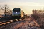 185 119-4 (Captrain) zu sehen am 07.03.21 im Sonnenaufgang in Pößneck Richtung Saalfeld.