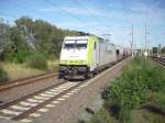 186-148 der Captrain Bahngesellschafft mit einem Transcerials-Waggonzug.