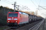 DB Cargo Deutschland AG mit  185 063-5  [NVR-Number: 91 80 6185 063-5 D-DB] und Kesselwagenzug (geschmolzenes Schwefel) am 12.02.19 Bf.