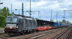 DB Cargo Deutschland AG mit der MRCE Vectron  X4 E - 704  [NVR-Nummer: 91 80 6193 704-4 D-DISPO] und KLV-Zug (LKW Walter Trailer) am 05.07.19 Bf.