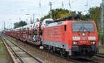 DB Cargo AG [D] mit  189 022-7  [NVR-Nummer: 91 80 6189 022-7 D-DB] mit PKW-Transportzug (VW Nutzfahrzeuge aus polnischer Produktion) am 25.09.19 Berlin Hirschgarten.