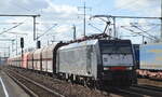 DB Cargo AG [D] mit der polnischen MRCE Dispo  ES 64 F4-457  [NVR-Nummer: 91 51 5170 031-6 PL-DISPO] und einem kurzem Schüttgutwagenzug (Erz?) am 23.02.22 Durchfahrt Bf.