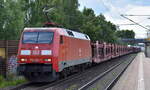 DB Cargo AG, Mainz mit ihrer  152 092-3  (NVR:  91 80 6152 092-3 D-DB ) und einem PKW-Transportzug (halb leer) am 06.07.23 Höhe Bahnhof Dedensen-Gümmer.