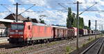 DB Cargo AG [D] mit ihrer  185 179-9  [NVR-Nummer: 91 80 6185 179-9 D-DB] und einem gemischten Güterzug am 01.08.23 Höhe Bahnhof Luckenwalde.