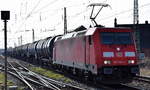 DB Cargo AG, Mainz mit ihrer  185 246-6  (NVR:  91 80 6185 246-6 D-DB ) und einem Kesselwagenzug am 19.03.24 Vorbeifahrt Bahnhof Magdeburg-Neustadt.
