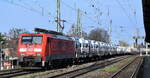 DB Cargo AG, Mainz mit ihrer  189 016-9  (NVR:  91 80 6189 016-9 D-DB ) und einem Fahrzeug-Transportzug (fabrikneue VW Nutzfahrzeuge) am 19.03.24 Vorbeifahrt Bahnhof Magdeburg-Neustadt.