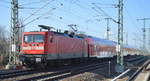 DB Regio Nordost mit  112 189-6  (NVR:  91 80 6112 189-6 D-DB ) mit dem RE1 nach Eisenhüttenstadt am 01.03.21 Berlin-Karlshorst.