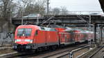 DB Regio Nordost mit  182 014  [NVR-Nummer: 91 80 6182 014-1 D-DB] und dem RE1 nach Frankfurt/Oder am 04.03.21 Berlin Wuhlheide.