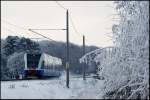 Bei frostigen Bedingungen ist am 20.12.2010 ein UBB 646er als UBB 29477 von Barth nach Stralsund zwischen Hp Grnhufe und Hbf Stralsund unterwegs.