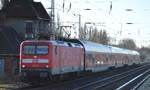 DB Regio AG, Region Nordost mit  112 103  (NVR-Nummer   91 80 6112 103-7 D-DB ) mit dem RE3 nach Stralsund HBf.