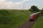 Am schwülen Abend des 06.06.15 wurde ein Doppelstockzug von Mühldorf nach München in Wimpasing (Nähe Ottenhofen) fotografiert.