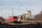 Die Kulisse des Lagerhauses der  Lagerhaus Feldkirchen Betriebs GmbH  diente am 04.02.17 als Motiv für die 245 008-8, die mit einem Doppelstockzug in Feldkirchen von München Hbf nach Mühldorf (Inn) unterwegs war.