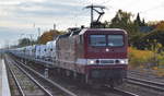 DeltaRail GmbH, Frankfurt (Oder) mit  243 559-2  [NVR-Nummer: 91 80 6143 559-3 D-DELTA] mit einem Transportzug fabrikneuer VW-Nutzfahrzeuge aus polnischer Produktion am 22.10.20 Berlin Hirschgarten.