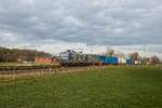 243 069-2 der DeltaRail mit einem Containerzug in Hamm-Neustadt (06.03.2023)