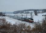 183 001 mit einem ALX nach Mnchen am 19.01.2013 bei Ergoldsbach.