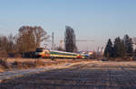 183 001 beschleunigt mit einem ALEX aus dem Bahnhof Freising um in wenigen Minuten den Zielbahnhof München HBF zu erreichen. Das Bild wurde am 30. Dezember 2016 aufgenommen.