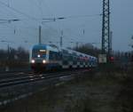 Da hat das letzte Licht gerade noch gereicht.223 063 hat 7 neue Alex-Doppelstockwagen aus Grlitz geholt,und berfhrt sie nach Neumark.Hier am 16.11.09 bei der Aussfahrt Zwickau(Sachs.)Hbf.