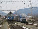 363 036-5 und VT 06A  Vogtland  der Vogtlandbahn begegnen sich am 18. Mrz 2013 in Decin-Vychod.