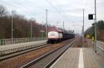 V 170 1142 der STRABAG(ehemalige NoHAB) durchfhrt am 02.12.08 den Bahnhof Burgkemnitz mit einem Schotterzug.