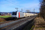 185 678 Railpool/EVB mit einem Schnittholzzug bei Pölling Richtung Nürnberg, 04.02.2021