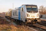 187 310-8 Railpool GmbH für wahrscheinlich evb logistik, stand mit einem Schienenschleifzug in Rathenow abgestellt.