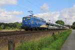 140 848-3 der EVB mit Autotransportzug in Fahrtrichtung Nienburg(Weser). Aufgenommen in Eystrup am 23.07.2015.