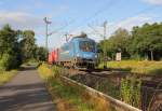 182 911-8 der MWB/EVB mit Containerzug in Fahrtrichtung Norden.