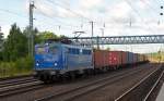 140 824 fuhr am 01.07.14 mit einem Containerzug durch Buchholz(Nordheide) Richtung Hamburg.