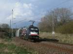 EGP ES64U2-002 mit dem Kreidezug aus Klementelvitz unterwegs,am 23.April 2012,zwischen Lietzow und Bergen/Rgen.